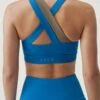 Born Living Yoga Top Cleo Gloss Blue/Fossil