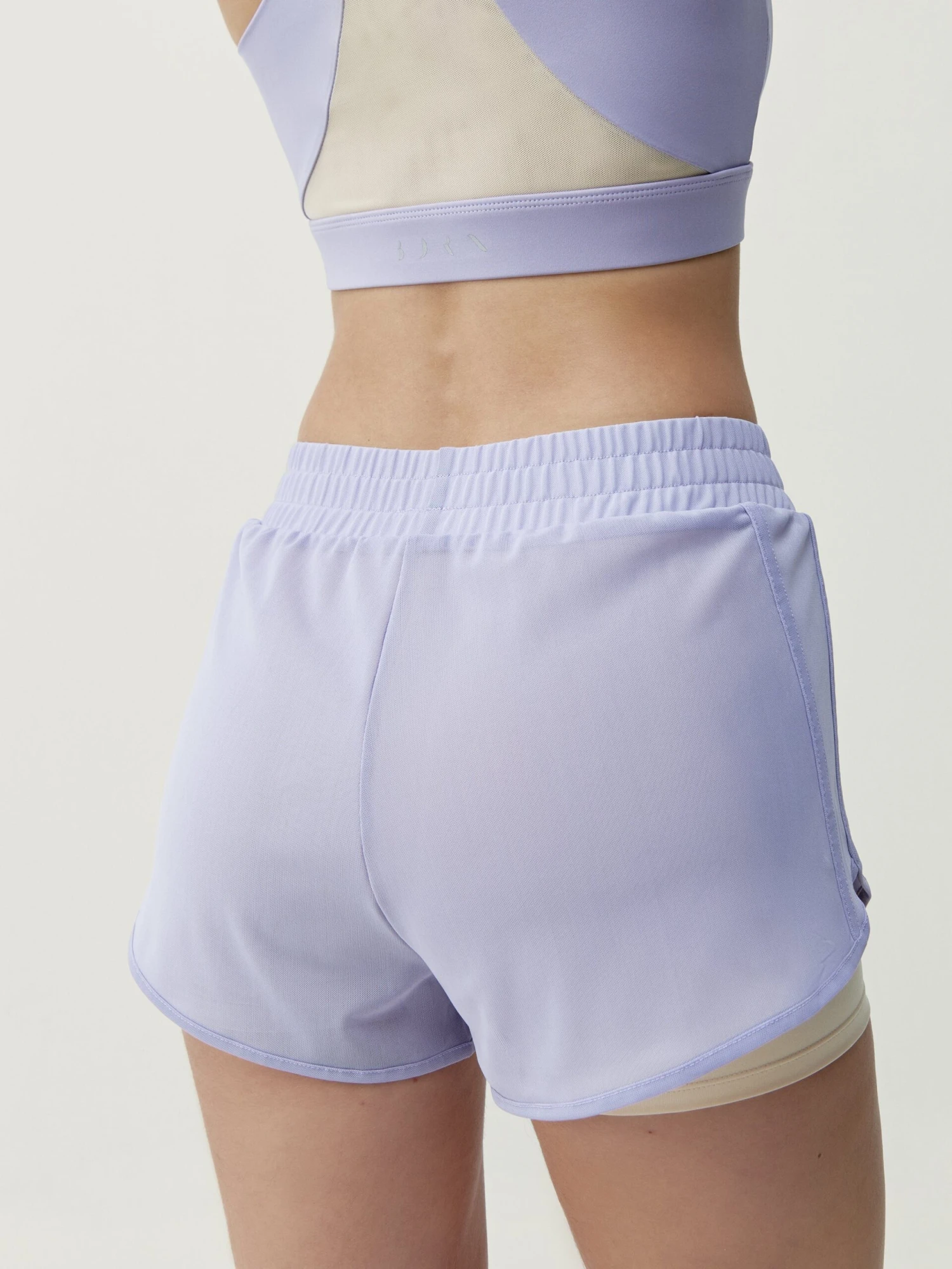 Born Living Yoga Short Padma 2.0 Lavanda Bright/Tapioca Soft - Imagen 5